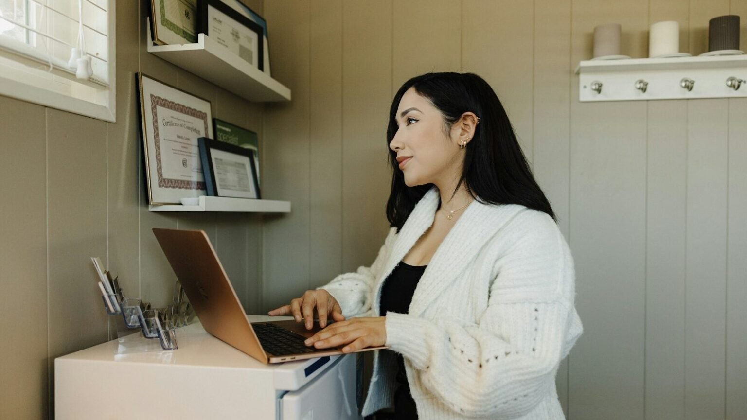 Small business owner working at a desk, the kind of budget-conscious business affordable SEO services are built for